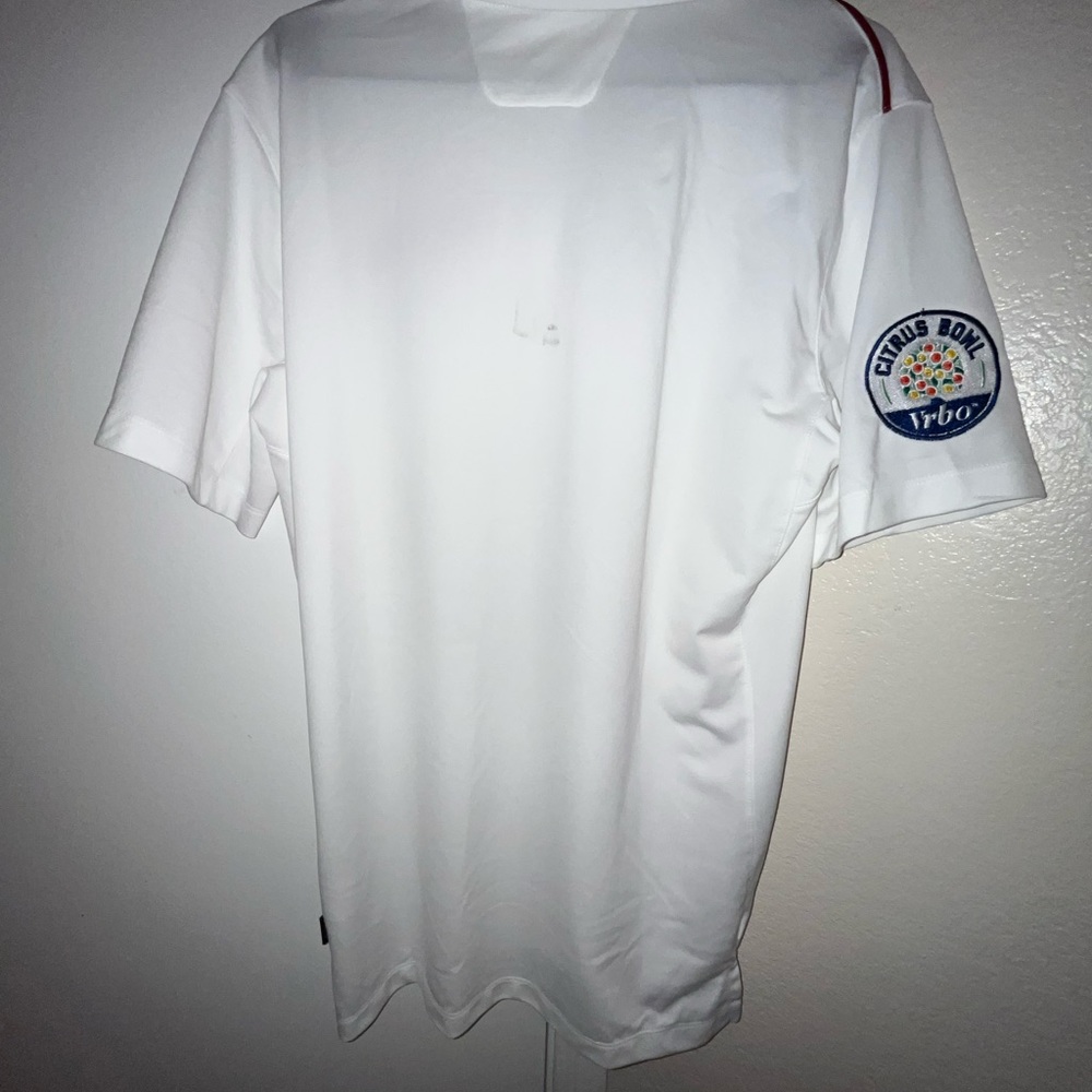 White Alabama polo with citrus bowl patch on sleeve from on the field gear